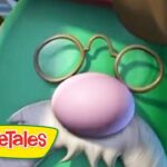 Close-up of a green cartoon character with a pink nose, round glasses, and a white beard; VeggieTales branding in the corner.