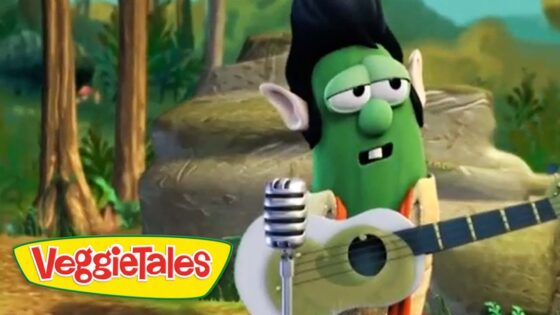 Green VeggieTales character with guitar performing outdoors, VeggieTales logo visible in the corner.