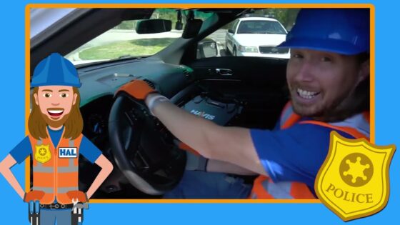 Driver wearing blue hard hat and orange safety vest, smiling, seated at the steering wheel inside a car; cartoon police frame and badge surround the image