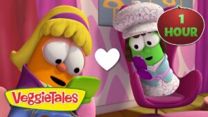 Two VeggieTales characters look at a phone together, with a white heart between them and a 1 HOUR badge in the corner.
