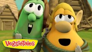Two VeggieTales characters pose together outdoors, with the VeggieTales logo in the corner.