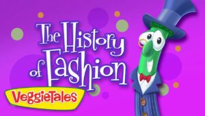Illustrated VeggieTales character—a green cucumber in a blue pinstripe suit and top hat—against a purple background with the title 'The History of Fashion' and a yellow VeggieTales banner.