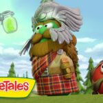 Outdoor VeggieTales scene: a large bearded owl in a plaid kilt and a surprised red vegetable with a mustache, logo in the corner.
