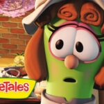 Animated green vegetable character with a hat and large eyes, looking surprised in a kitchen; VeggieTales logo in the lower-left corner.