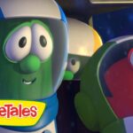 Two VeggieTales characters in space helmets, a green cucumber left and a red veggie right, with the VeggieTales logo in front.