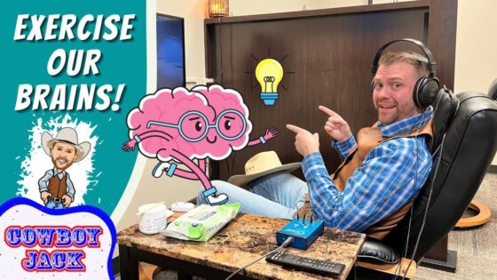 Video thumbnail: a smiling man in a headset sitting in a recliner, pointing at a large cartoon pink brain with glasses and a glowing lightbulb, beside bold ‘EXERCISE OUR BRAINS!’ text and a ‘COWBOY JACK’ logo.