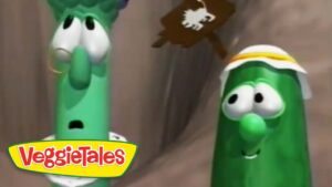 Two green VeggieTales cucumber characters look surprised, with the show's logo in the corner.