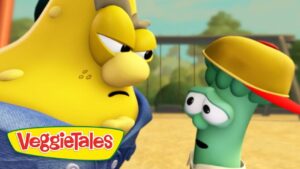Two VeggieTales characters—one tall yellow figure with a worried expression and a green broccoli wearing a wide hat—talking outdoors in a sunny setting, with the VeggieTales logo visible in the corner.