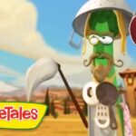 VeggieTales character, a green vegetable wearing a helmet, holding a shovel and cooking pan in a desert town scene; 20 Min badge visible in the corner.