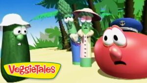 VeggieTales cartoon on a sunny beach: a large red tomato with a cap looks surprised while veggie characters stand behind it. Logo visible in corner.