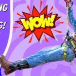 Man wearing a helmet ziplining midair on a bright purple background, with a bold WOW! explosion graphic and adventure text on the left panel.