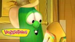 Larry the Cucumber from VeggieTales, with a cheerful smile and the VeggieTales logo visible in the corner.