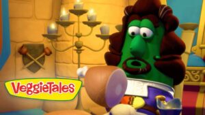 Green VeggieTales character with brown hair and a mustache, in a castle-like room, looking at a shiny armor piece; VeggieTales logo in the bottom-left corner.