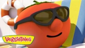 Orange VeggieTales character wearing sunglasses and smiling while lounging in a sunny setting; VeggieTales logo in corner.