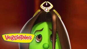 Green VeggieTales character with a crown and long brown hair, peeking from the side with a concerned expression, VeggieTales logo present.