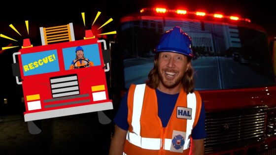 Smiling person in orange safety vest and blue hard hat beside a red fire truck at night, with a cartoon rescue truck on the left. (Informative thumbnail)