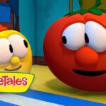 Animated VeggieTales scene: a yellow round character wearing a small red firefighter helmet chats with a red tomato character holding a broom indoors, VeggieTales logo visible.