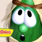 Green VeggieTales character with wide, surprised eyes and open mouth, wrapped in beige bandages or cloth, VeggieTales logo in the lower-left corner.