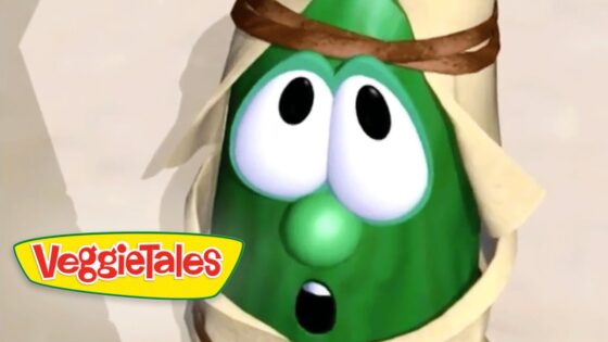 Green VeggieTales character with wide, surprised eyes and open mouth, wrapped in beige bandages or cloth, VeggieTales logo in the lower-left corner.