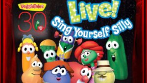 Group of VeggieTales characters posing on a stage for Live! Sing Yourself Silly 30th Anniversary promo.