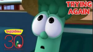 Worried green VeggieTales character with a 'Trying Again' banner and 30th Anniversary logo in the corner.