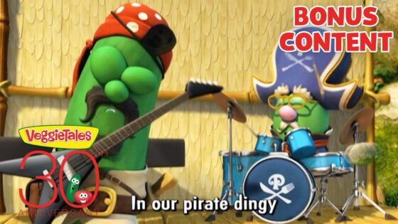 VeggieTales characters perform pirates-themed music on stage; band with cucumber playing guitar and another at drums, 'BONUS CONTENT' text overlays.