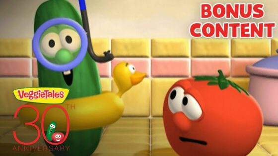 VeggieTales scene in a kitchen: a green cucumber with a yellow rubber duck and a red tomato looking at each other; 'BONUS CONTENT' banner in the corner.