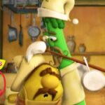 Two VeggieTales cartoon vegetables in a warm kitchen share a hug, with one wearing a chef hat and apron and the other holding a drum; a VeggieTales 30th Anniversary logo is in the lower left corner.
