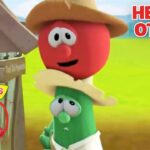 Bob the Tomato and Larry the Cucumber lean on a wooden water well, with a 'Helping Others' banner and VeggieTales 30th Anniversary logos in view.