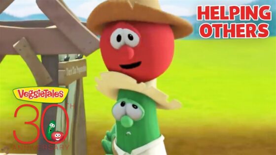 Bob the Tomato and Larry the Cucumber lean on a wooden water well, with a 'Helping Others' banner and VeggieTales 30th Anniversary logos in view.