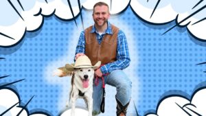 Man in a blue plaid shirt and brown vest kneels with a dog wearing a cowboy hat, against a blue comic-book backdrop with clouds and polka dots.