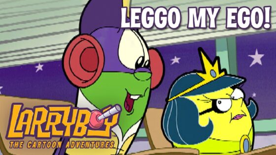 Two bright cartoon characters at a desk, one with red headphones and the other wearing a crown, under the caption 'LEGO MY EGO!' (LarryBoy: The Cartoon Adventures logo visible).
