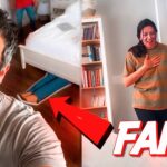 Split-screen thumbnail: man taking a selfie on the left, a woman standing in a doorway on the right with hand on her chest; a red arrow points toward her and bold 'FAKE' text overlays the image.