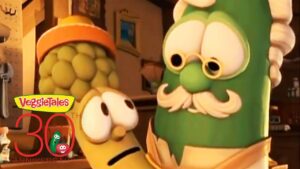 Close-up of VeggieTales characters—a green vegetable with glasses and a mustache beside a yellow, worried-looking veggie—with a VeggieTales 30th Anniversary logo in the foreground.