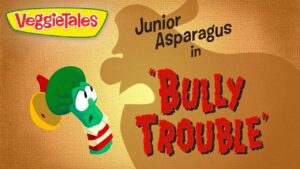 VeggieTales title card: Junior Asparagus in 'Bully Trouble' with VeggieTales logo on a textured orange background.