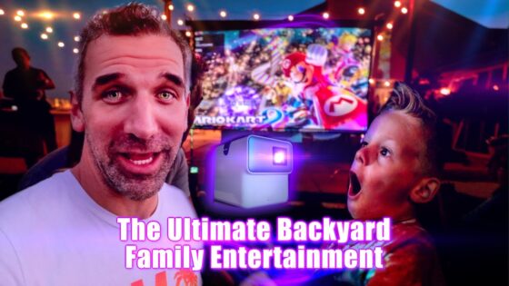 Thumbnail showing a man and a surprised child in a gaming setup with a large screen and colorful lights, promoting backyard family entertainment.