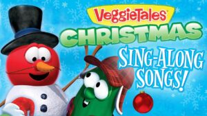 VeggieTales Christmas Sing-Along Songs cover featuring Bob the Tomato in a top hat and Larry the Cucumber in a plaid hat against a snowy blue background with snowflakes and ornament