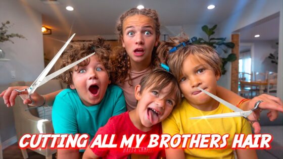 Four kids with surprised expressions pose with large scissors toward the camera, a playful home video thumbnail.
