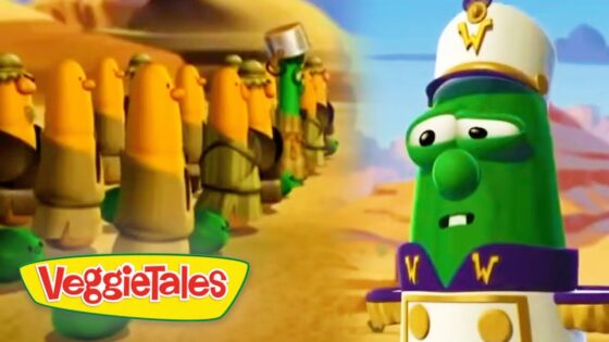 Green VeggieTales character in a captain’s hat faces a line of yellow-armored soldiers in a desert setting; VeggieTales logo bottom left.