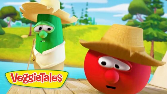 Two VeggieTales characters—a cucumber and a tomato—wear straw hats on a wooden dock by a sunny river, with surprised expressions.