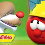 Animated tomato wearing a yellow hard hat chats with a doglike character; VeggieTales logo at the bottom left.