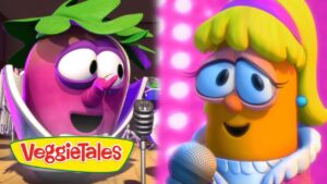 Two VeggieTales characters singing into microphones on a colorful stage, VeggieTales logo visible on the left.
