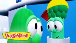 Two green VeggieTales characters with big eyes converse on a colorful set; VeggieTales logo appears in the bottom-left corner.