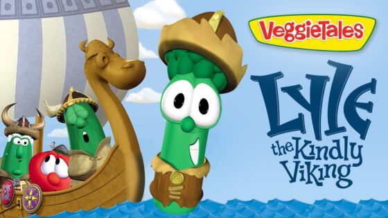 Lyle the Kindly Viking, a green cucumber wearing a Viking helmet, aboard a wooden ship with veggie friends; VeggieTales logo on the side.