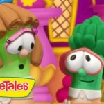 Two anthropomorphic vegetables from VeggieTales share a moment in a bright, whimsical set; the VeggieTales logo sits in the bottom-left corner.
