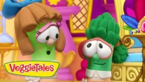 Two anthropomorphic vegetables from VeggieTales share a moment in a bright, whimsical set; the VeggieTales logo sits in the bottom-left corner.