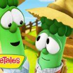 Two green VeggieTales characters, one wearing a straw hat, chat happily outdoors on a sunny farm with the VeggieTales logo visible.