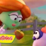 Green-skinned girl with orange hair hands an apple to a purple creature in a sunny farm scene; VeggieTales logo at the bottom left.