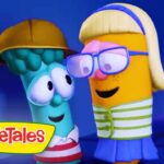 Two VeggieTales characters wearing glasses laugh together, with the VeggieTales logo in the lower left corner.