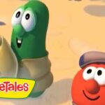Two VeggieTales characters, a green bean and a red tomato with a hat, stand in a sandy desert; VeggieTales logo in the corner.